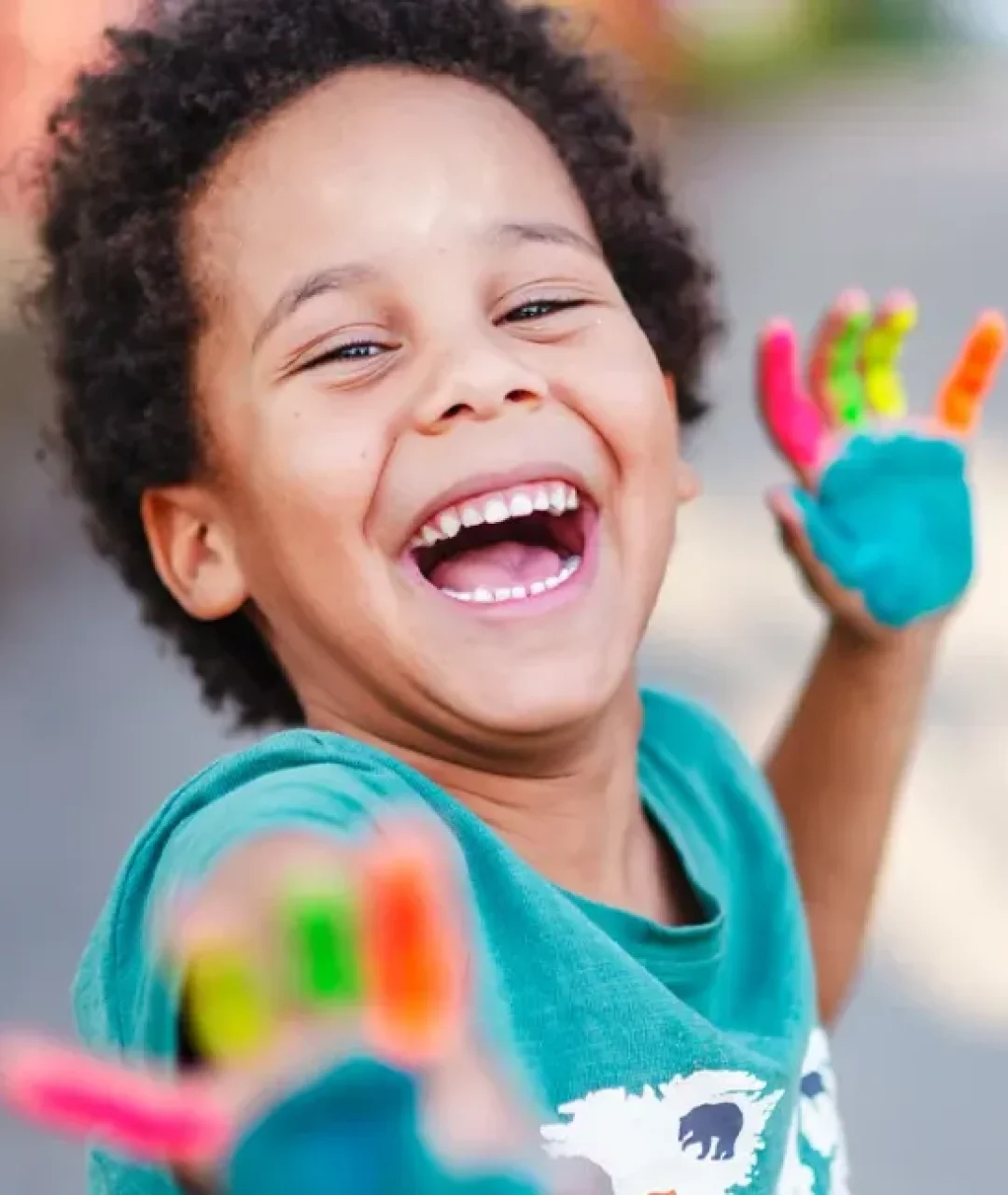 happy-boy-with-painted-hands-1296x728-header